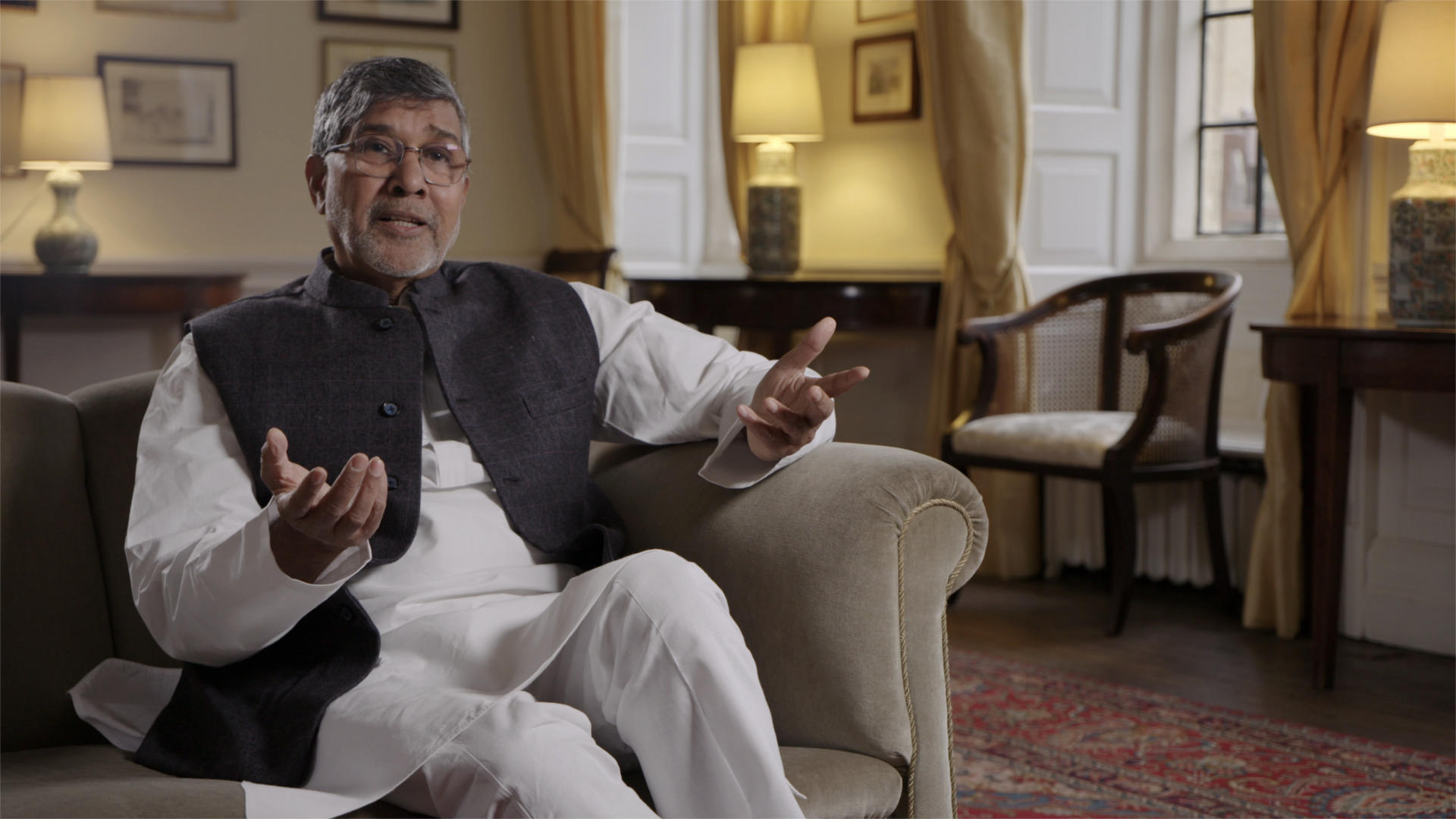Kailash Satyarthi Coloured Disparity Film Still, Kailash Satyarthi sitting