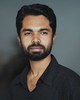 K M Asad Portrait of documentary photographer K M Asad