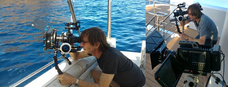 Kane Kramer 3 Kane Kramer with camera filming on boat