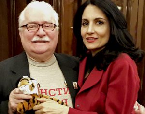 Lech, Renu & Tim2 Renu Mehta with Lech Walesa, Solidarity, and tiger Tim toy